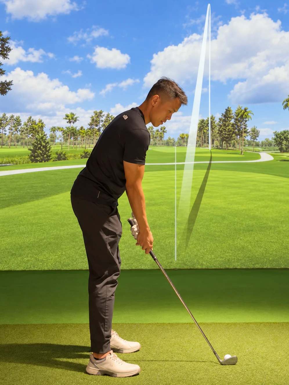 A golfer practising in a Trackman simulator bay at Smash Factor